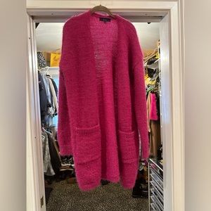 Luxurious Rachel Roy sweater in the season’s hottest color!